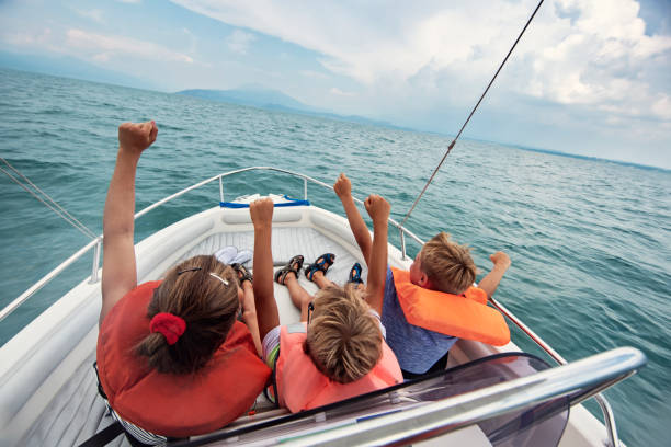 Family enjoying a day on a boat